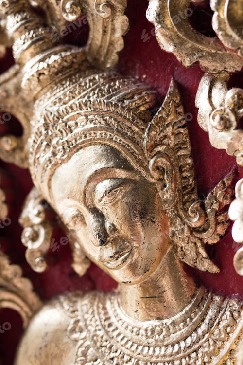 Ornate Golden Religious Figure Sculpture Close-Up