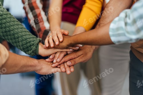 Preview: Diverse Group Cooperation Team Showing Unity And Support Through Connected Hands