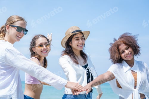 Preview: Happy friends enjoy and fun outdoor activity lifestyle on holiday travel vacation at the sea.