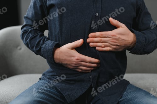 Preview: Senior gentleman suffering from pain in bedroom