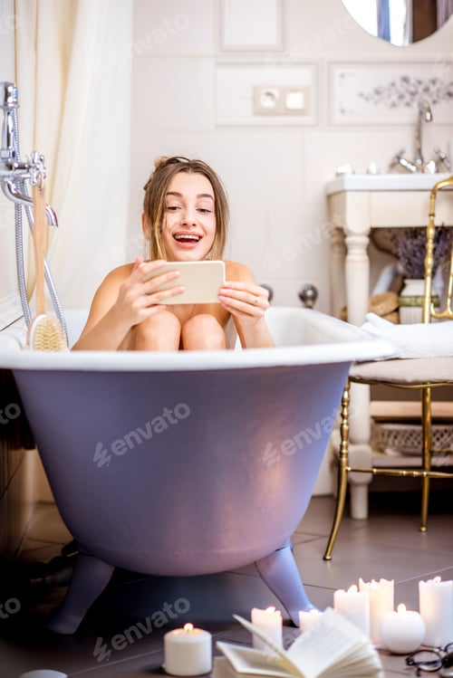 Preview: Woman bathing at the retro bathroom