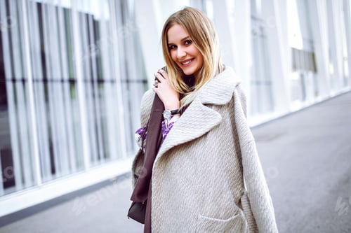 Preview: Outdoor lifestyle positive portrait of pretty blonde woman smiling end enjoy time