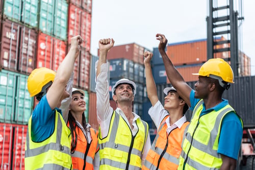 Preview: Group of young male and female worker working in container terminal.