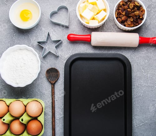 Preview: Top view of kitchen table with various ingredients