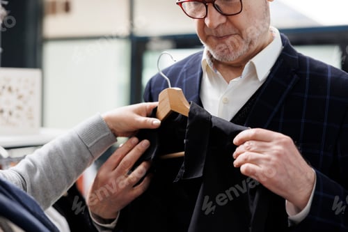 Preview: Well-Dressed Man Shopping for a Black Blazer