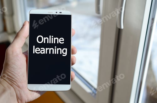 Preview: A person sees a white inscription on a black smartphone display that holds in his hand