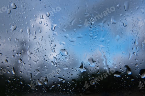 Preview: Looking through the glass on a rainy day
