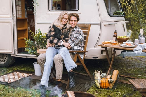 Preview: Young just married couple traveling in camper,house on wheels,trailer,motor home.Love romantic road