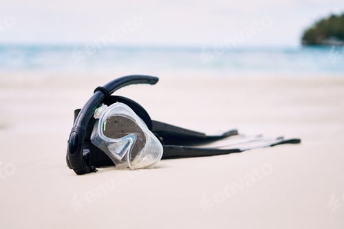 Preview: Its time to go down under. Still life shot of snorkeling gear on a beach in Raja Ampat, Indonesia.