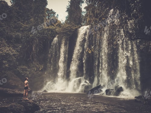 Preview: A man at the waterfall, Phnom Koulen at Siem Reap, Cambodia