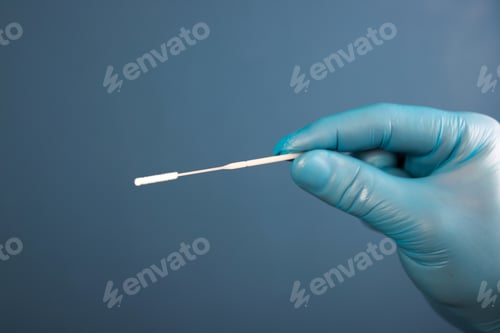 Preview: Doctor with laboratory COVID-19 test kit for diagnosis coronavirus infection.
