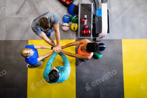 Preview: Fitness, sport, training, gym, success concept. Group of happy people in the gym celebrating victory