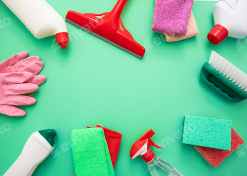 Preview: Cleaning products background, detergent bottles and tools, copy space