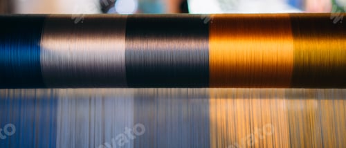 Preview: Silk thread from weaving machine traditional craft, a vibrant tapestry of color.