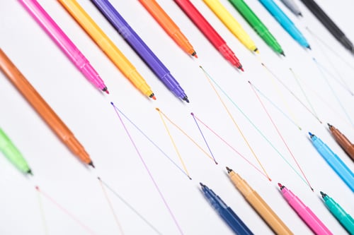Preview: colorful felt-tip pens on white background with connected drawn lines, connection and communication