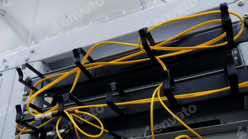Preview: Yellow bright thin wires. Stock footage. Intertwined wires in disassembled equipment.
