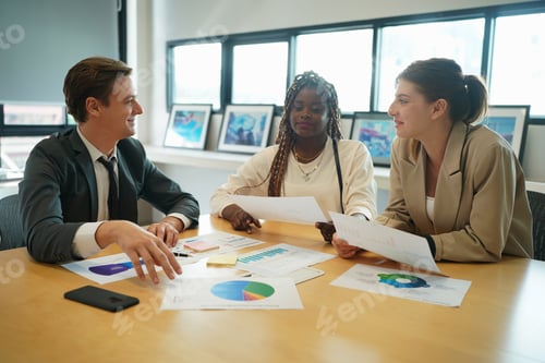 Preview: Shot of a group of businesspeople in a meeting at work