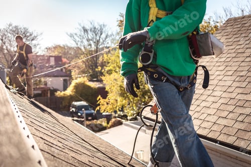 Preview: Solar panel installation crew on roof of house