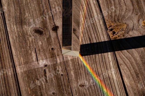 Preview: Futuristic cool background with glass prisms and light shadows on a wooden surface