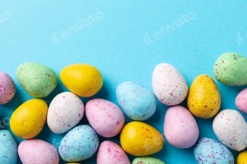 Preview: Multicolor Easter eggs on blue background, space for text
