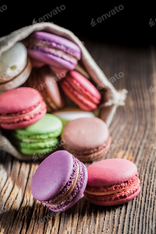 Preview: Sweet macaroons on wooden background