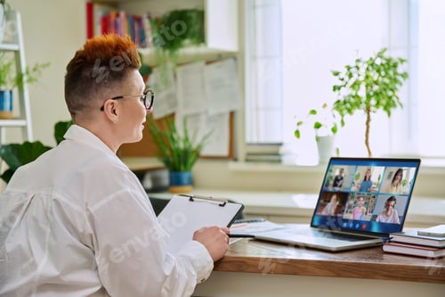 Preview: Woman teacher, counsellor working online, high school students on computer screen