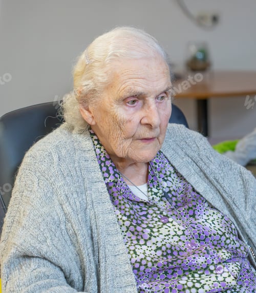 Preview: Pensive Caucasian senior woman in a nursing home