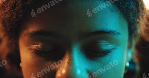 Preview: Calm, neon and woman with eyes closed, light and closeup of face, unique and artistic with glow or
