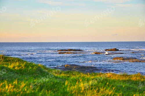 Preview: Sunny Cliffs of Kilkee in Ireland county Clare Sunset. Tourist destination