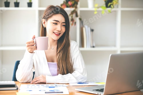 Preview: business woman work in the business office on the desk