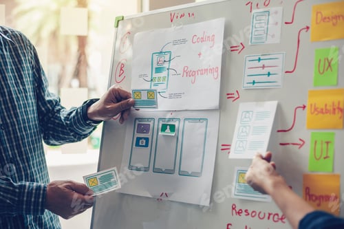 Preview: Designer team drawing website ux app development application for mobile phone.