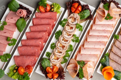 Preview: Platter of fresh meat cold cuts on table