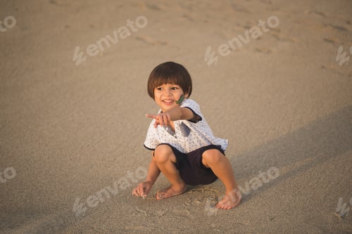 Preview: beautiful baby on the beach