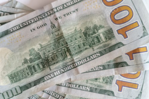 Preview: Backsides of one hundred dollar bills close up