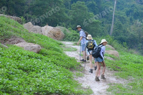 Preview: A group of friends going hiking in the streams of the tropical forest area.