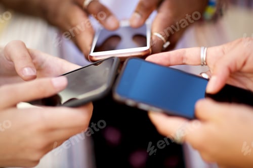 Preview: group of young women hands holding mobile phones