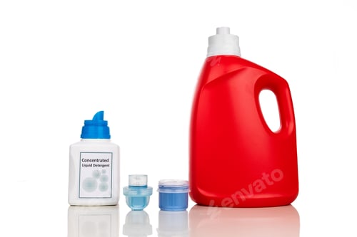 Preview: Comparison of regular and concentrated laundry liquid detergent against white background