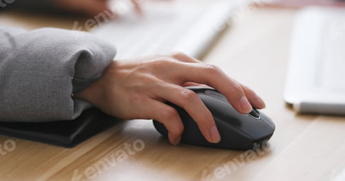 Preview: Designer working on computer and drawing pad