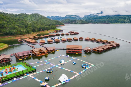 Preview: Aerial view, Wooden raft resort with waterpark in tropical forest on dam at Kanchanaburi