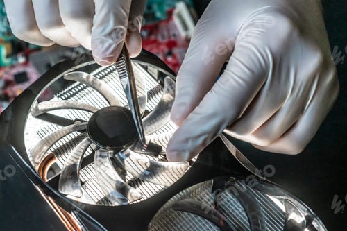 Preview: professional engineer in laboratory working with micro electronic cooler fan f