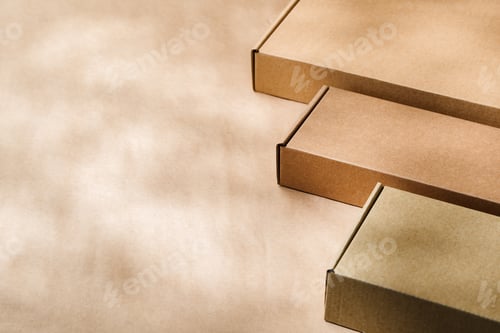 Preview: Brown cardboard boxes arranged on a neutral background in a warehouse setting during daylight hours