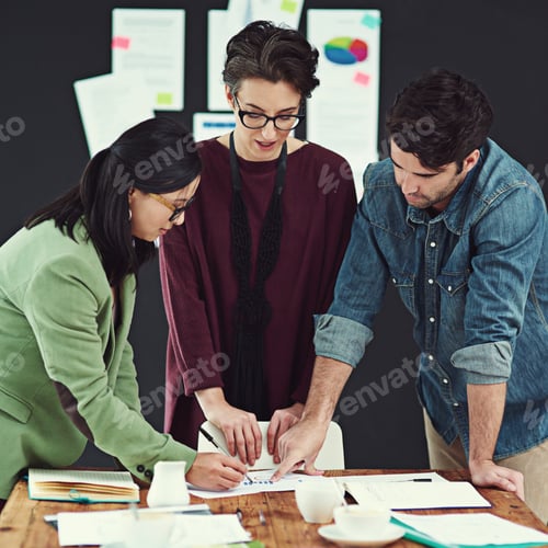 Preview: Cropped shot of a group of young creatives having a meeting in a modern office