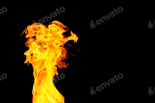 Preview: Close up of yellow flames and copy space on black background