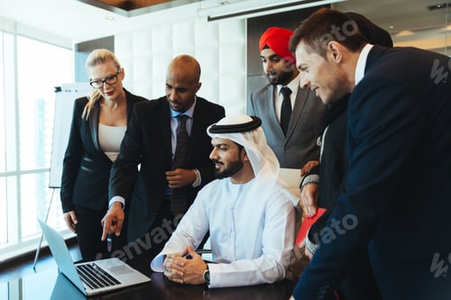 Preview: Mixed business team making agreements on future business plans. in the office