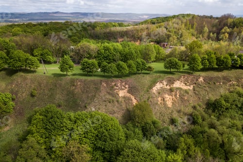 Preview: Aerial view of green summer forest or a park with many fresh trees.