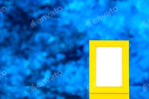 Preview: front view yellow picture frame on light blue background portrait color shoot present family gift
