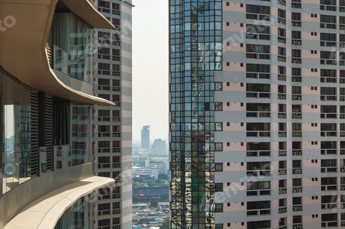 Preview: Facade of modern condo building in the Bangkok city