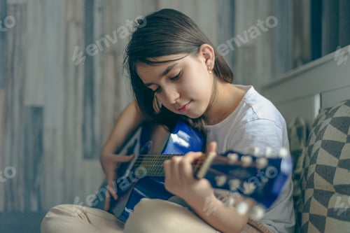 Preview: Girl Practices Guitar At Home, Quiet Moment