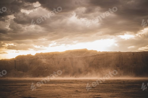 Preview: Scenic view of a beautiful dusty canyon against a cloudy sky