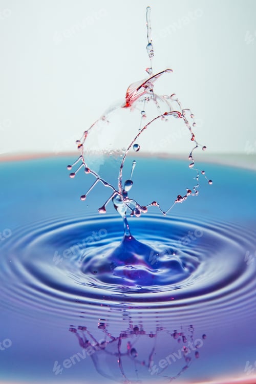 Preview: Abstract background of splash of color water, collision of colored drops, the concept